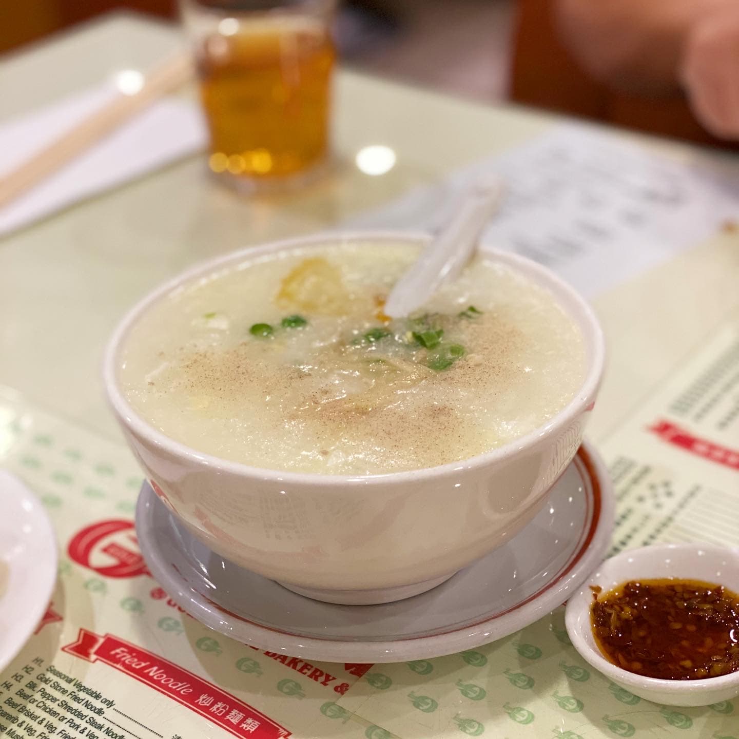 Fish congee with egg. Photo by Therise Wen Li Lee.