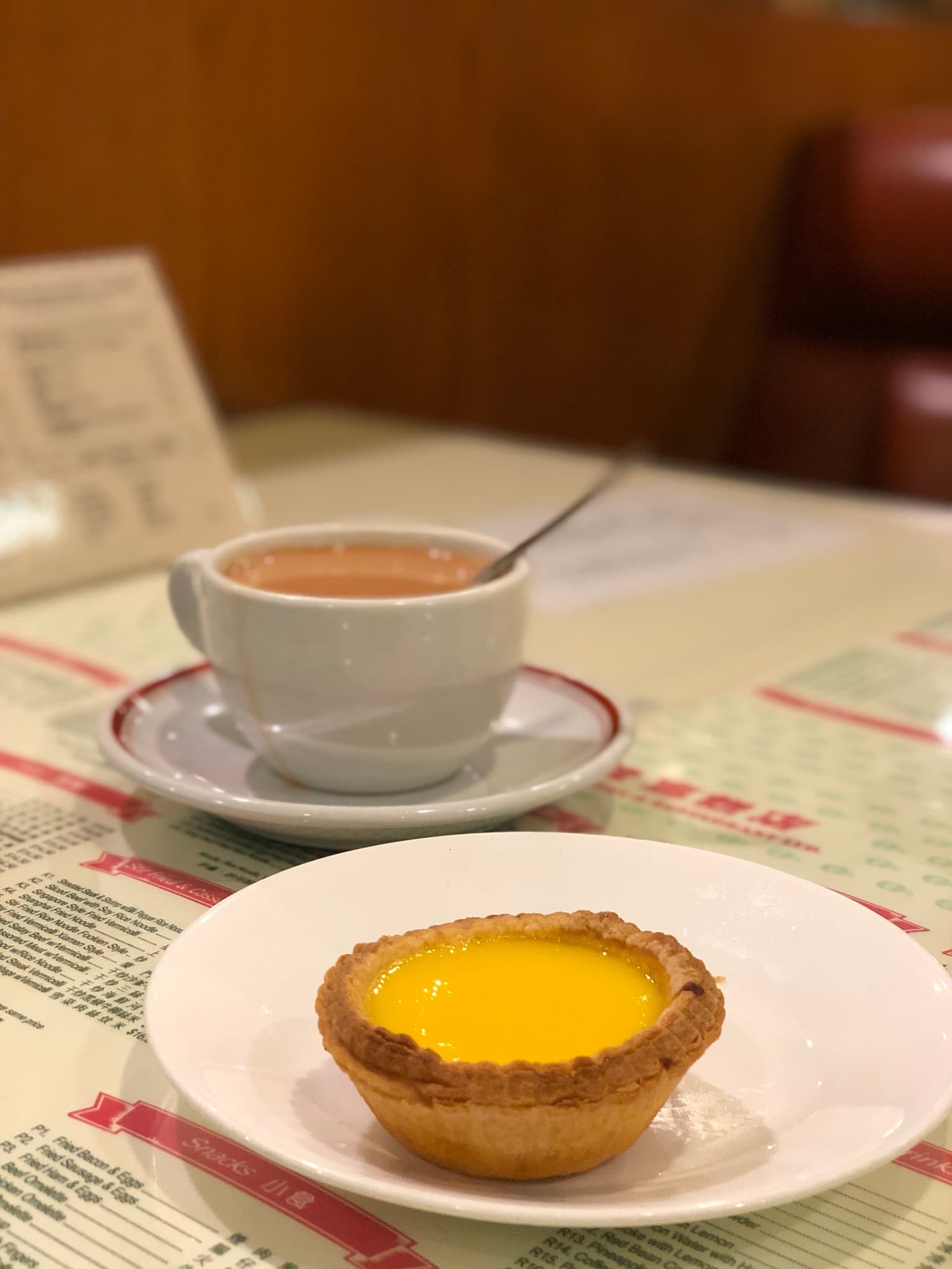 Hong Kong style milk tea with egg tart. Photo by Therise Wen Li Lee.